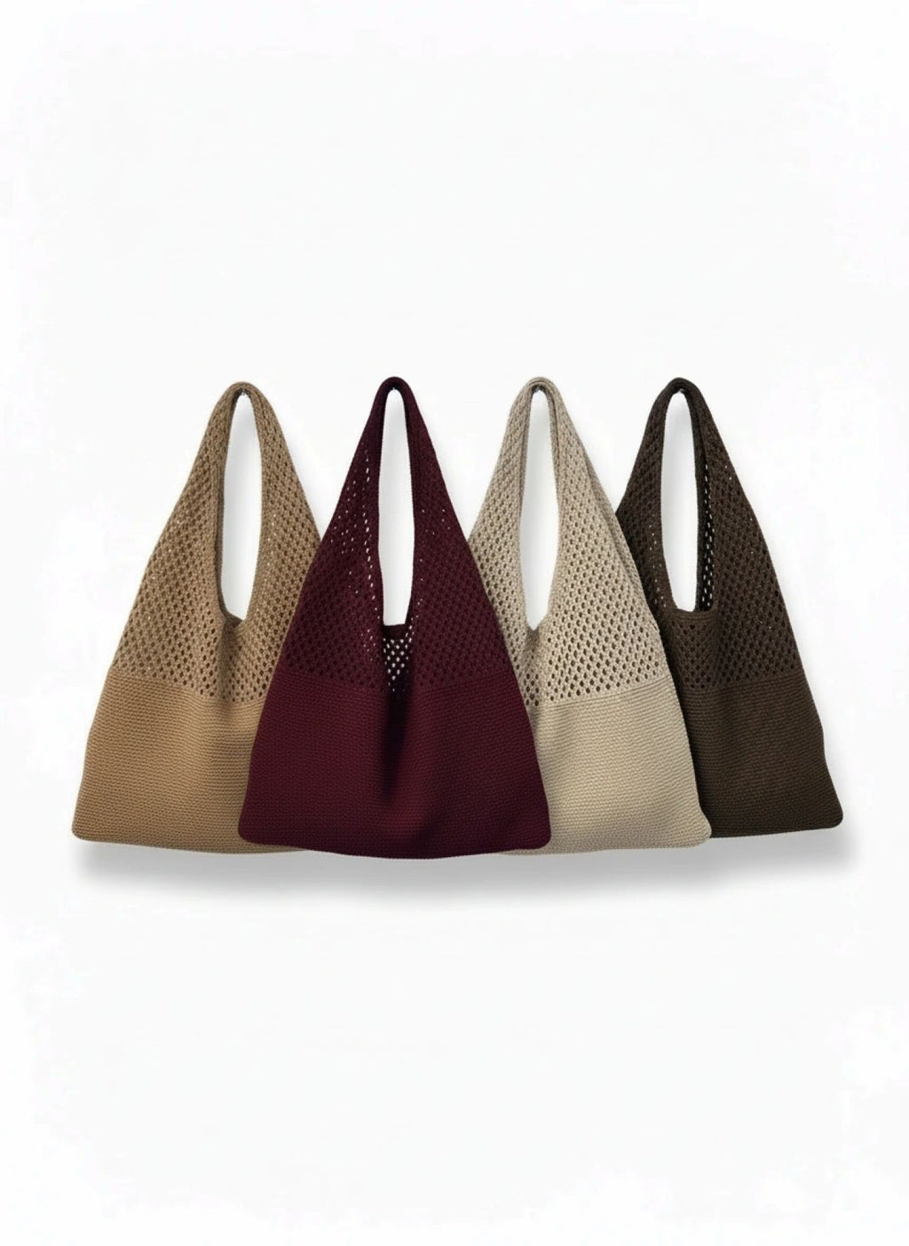 Four handbags in different colors on a white background